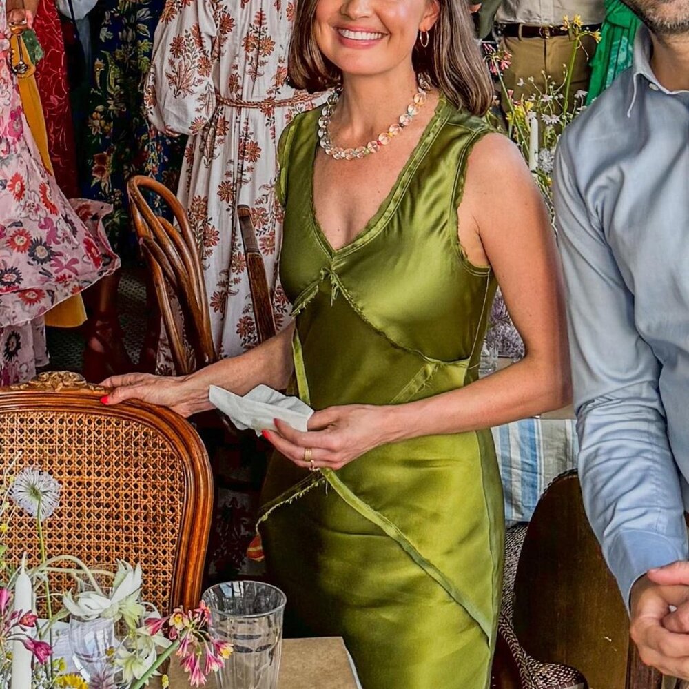 SOLD - Reformation x Camille Rowe Olive green silk slip dress.